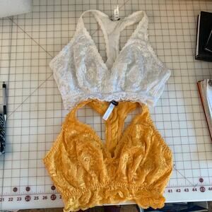 2 Casabella golden yellow and white bralettes size large